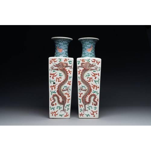 307 - A pair of Chinese famille verte 'dragon' vases and wooden stands, Chenghua mark, 19th C.H.: 58 cm (i... 