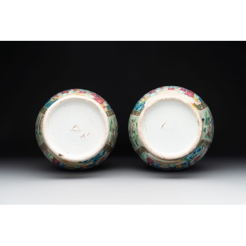 310 - A pair of Chinese Canton famille rose celadon-ground 'court scene' vases, 19th C.H.: 43 cm... 