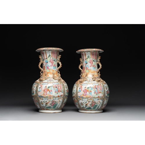 311 - A pair of Chinese Canton famille rose vases with narrative design, 19th C.H.: 36 cm... 