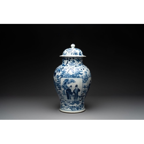 316 - A pair of Chinese blue and white vases and covers with figural panels, 19th C.H.: 50 cm (incl. cover... 