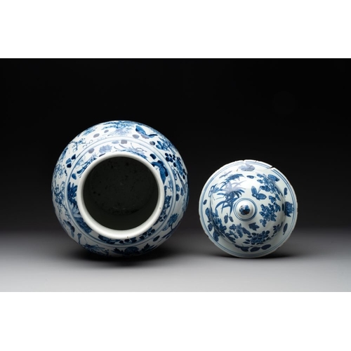 316 - A pair of Chinese blue and white vases and covers with figural panels, 19th C.H.: 50 cm (incl. cover... 