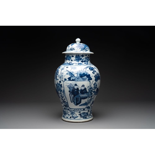 316 - A pair of Chinese blue and white vases and covers with figural panels, 19th C.H.: 50 cm (incl. cover... 