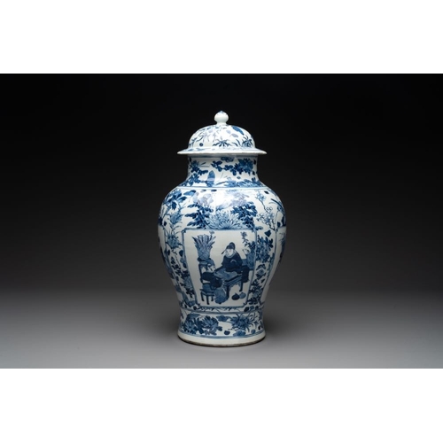 316 - A pair of Chinese blue and white vases and covers with figural panels, 19th C.H.: 50 cm (incl. cover... 