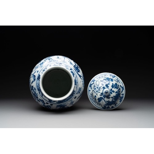 316 - A pair of Chinese blue and white vases and covers with figural panels, 19th C.H.: 50 cm (incl. cover... 