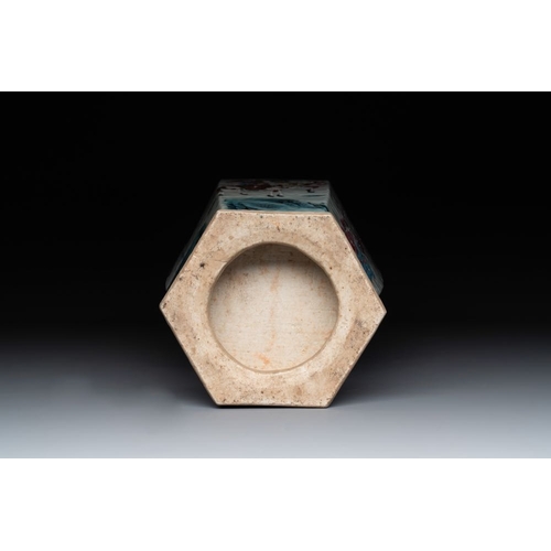 319 - A Chinese Canton famille rose hexagonal vase with narrative design, 19th C.H.: 44 cm... 