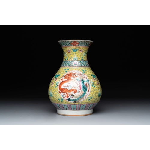 326 - A Chinese famille rose yellow-ground 'dragon and phoenix' vase and a fitted box, Qianlong mark, Repu... 