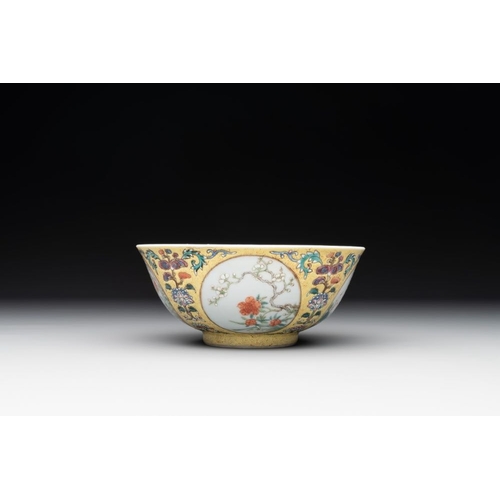 334 - A Chinese blue, white and famille rose bowl with floral design, Qianlong mark, 19/20th C.Dia.: 15 cm... 