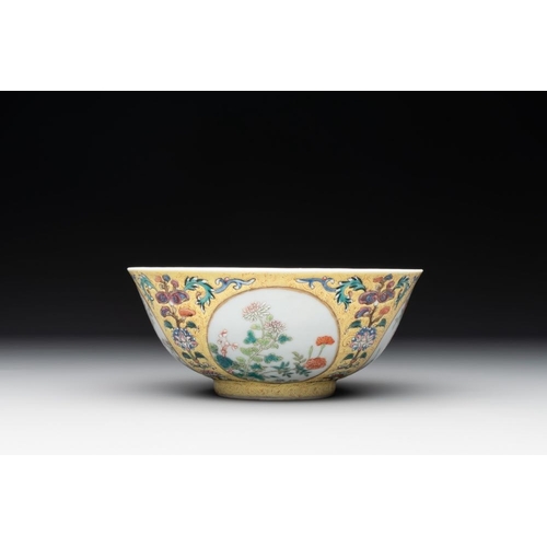 334 - A Chinese blue, white and famille rose bowl with floral design, Qianlong mark, 19/20th C.Dia.: 15 cm... 