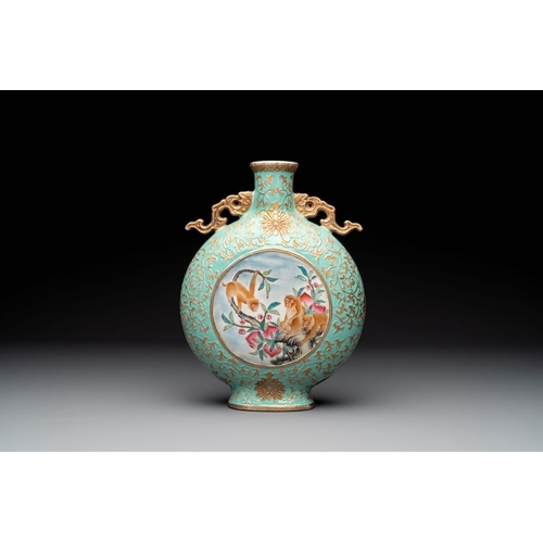 351 - A Chinese gilt-decorated famille rose turquoise 'monkeys' and 'dogs' moon flask, Qianlong mark, 20th... 