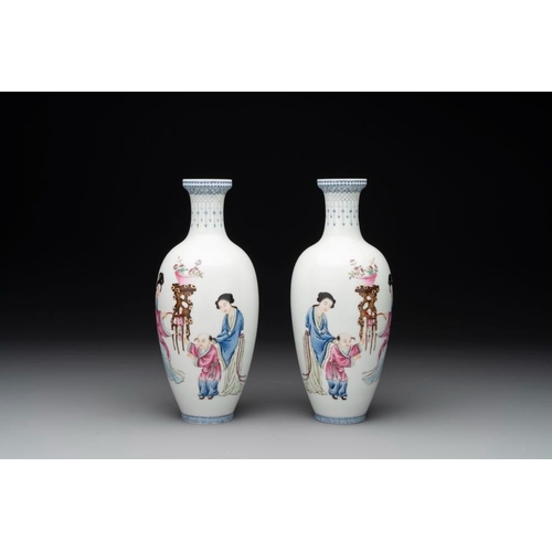 372 - A pair of Chinese famille rose semi-eggshell 'ladies and boys' vases, Hongxian mark, 20th C.H.: 21,2... 