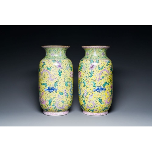 386 - A pair of Chinese famille rose yellow-ground 'dragon' vases, Qianlong mark, RepublicH.: 42,5 cm... 