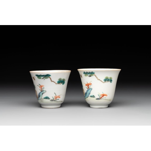 395 - A pair of Chinese famille rose 'monkey and deer' cups and saucers, Tongzhi mark and of the periodDia... 