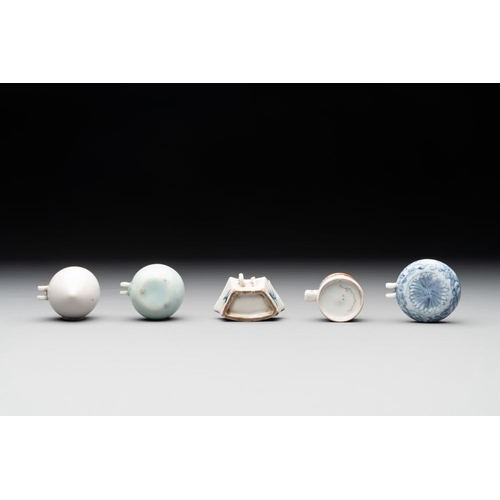 398 - A collection of nine Chinese blue and white, monochrome and famille rose bird feeders, 19th C.Dia.: ... 