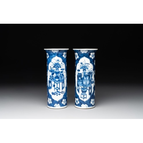 435 - A pair of Chinese blue and white 'gu' vases, three jars, a plate and a plaque, Kangxi mark, 19th C.H... 