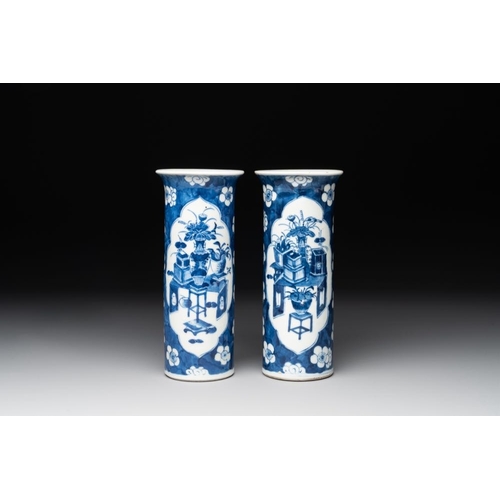 435 - A pair of Chinese blue and white 'gu' vases, three jars, a plate and a plaque, Kangxi mark, 19th C.H... 