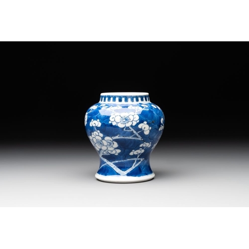 435 - A pair of Chinese blue and white 'gu' vases, three jars, a plate and a plaque, Kangxi mark, 19th C.H... 