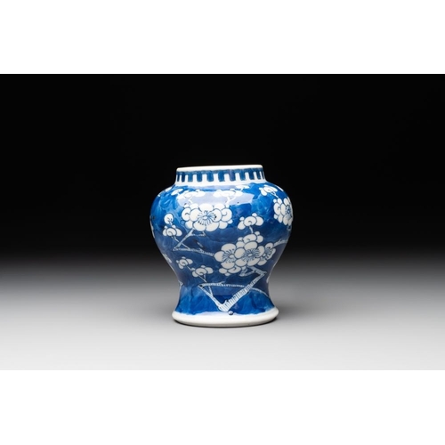 435 - A pair of Chinese blue and white 'gu' vases, three jars, a plate and a plaque, Kangxi mark, 19th C.H... 