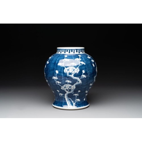 435 - A pair of Chinese blue and white 'gu' vases, three jars, a plate and a plaque, Kangxi mark, 19th C.H... 