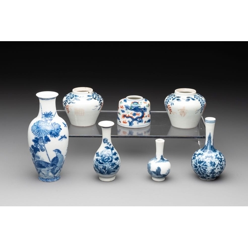 436 - Seven Chinese blue, white and doucai vases, Wanli/Yongzheng/Qianlong mark, 19th C.H.: 5,5 cm (the sm... 