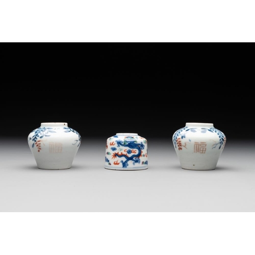 436 - Seven Chinese blue, white and doucai vases, Wanli/Yongzheng/Qianlong mark, 19th C.H.: 5,5 cm (the sm... 