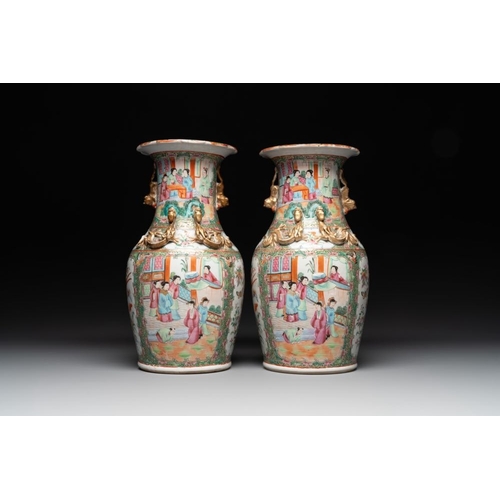 448 - A Chinese famille verte 'mythical animal' vase and two Canton famille rose vases, 19th C.H.: 35 cm (... 