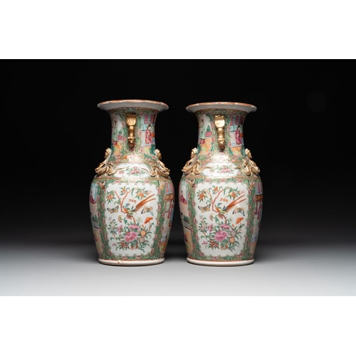 448 - A Chinese famille verte 'mythical animal' vase and two Canton famille rose vases, 19th C.H.: 35 cm (... 