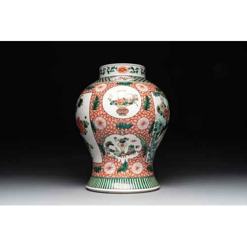 448 - A Chinese famille verte 'mythical animal' vase and two Canton famille rose vases, 19th C.H.: 35 cm (... 