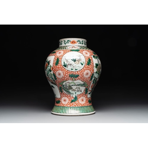 448 - A Chinese famille verte 'mythical animal' vase and two Canton famille rose vases, 19th C.H.: 35 cm (... 