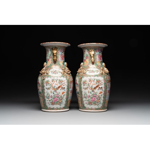 448 - A Chinese famille verte 'mythical animal' vase and two Canton famille rose vases, 19th C.H.: 35 cm (... 