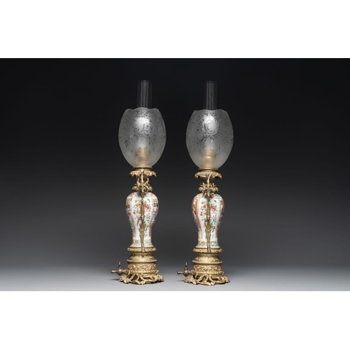 449 - Two Chinese Canton famille rose vases mounted as lamps, a pair of vases and a bronze-mounted bowl, 1... 