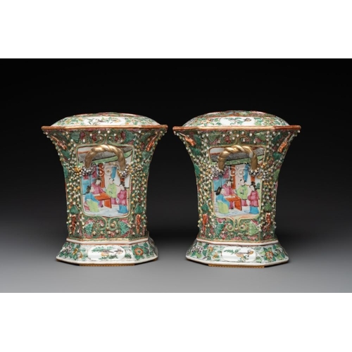 450 - A pair of Chinese Canton famille rose flower holders and covers with figural design, 19th C.H.: 23,5... 