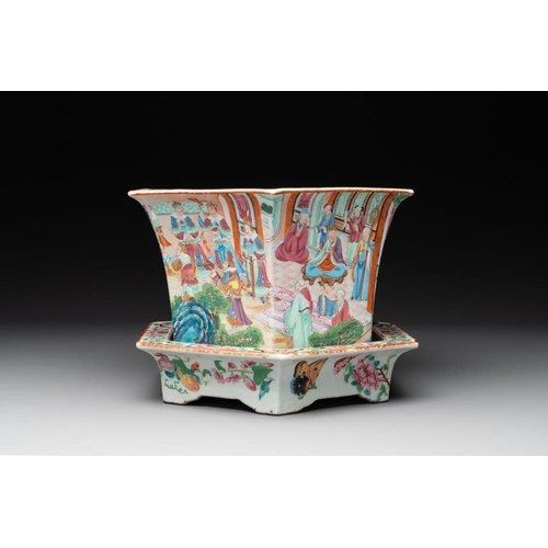 457 - A Chinese Canton famille rose hexagonal jardiniere and stand with narrative design, 19th C.Dia.: 28,... 