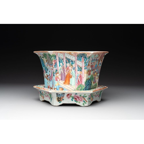 457 - A Chinese Canton famille rose hexagonal jardiniere and stand with narrative design, 19th C.Dia.: 28,... 