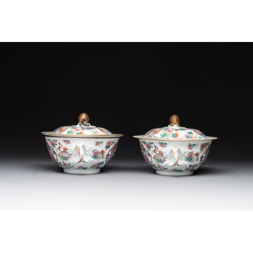 458 - A pair of Chinese Canton famille rose two-handled bowls and covers with narrative design, 19th C.L.:... 