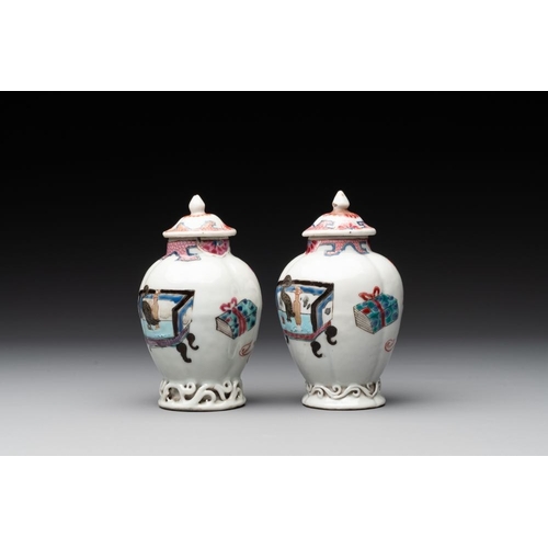 504 - A pair of Chinese famille rose 'antiquities' tea caddies and covers, Yongzheng/QianlongH.: 12 cm (in... 