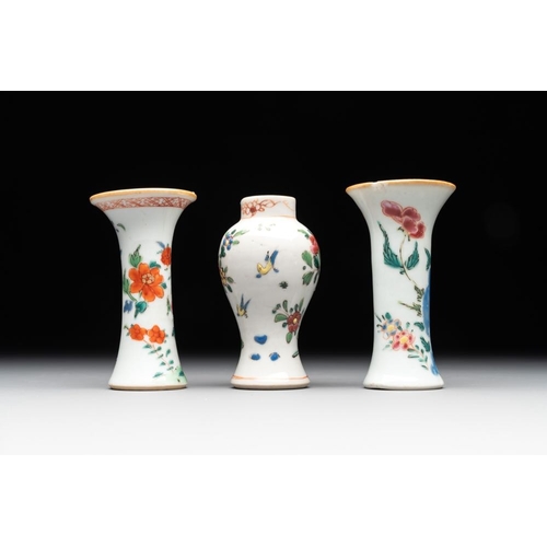 505 - A Chinese famille rose tea caddy, two covered milk jugs and three vases, Yongzheng/QianlongL.: 12 cm... 