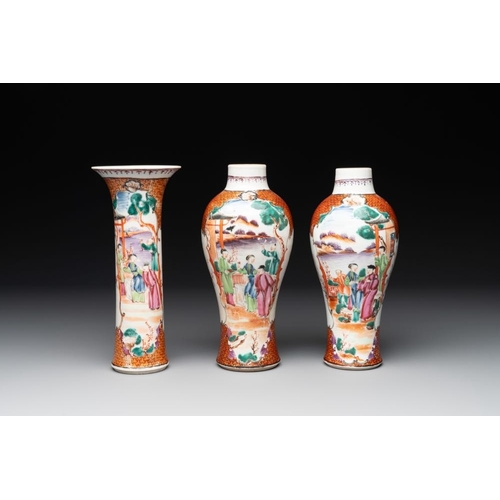 506 - A Chinese famille rose 'mandarin subject' garniture of three vases, QianlongH.: 20,7 cm (the tallest... 