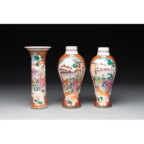 506 - A Chinese famille rose 'mandarin subject' garniture of three vases, QianlongH.: 20,7 cm (the tallest... 