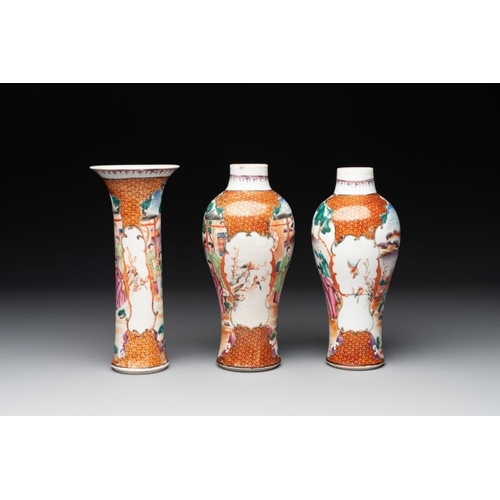 506 - A Chinese famille rose 'mandarin subject' garniture of three vases, QianlongH.: 20,7 cm (the tallest... 