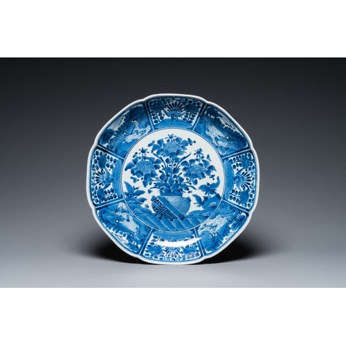 532 - A Japanese Arita blue and white 'flower basket' dish, Edo, 18th C.Dia.: 40 cm - H.: 8 cm... 