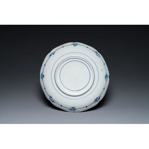 532 - A Japanese Arita blue and white 'flower basket' dish, Edo, 18th C.Dia.: 40 cm - H.: 8 cm... 