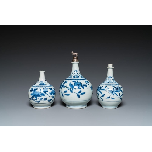 533 - Three Japanese blue and white Arita 'birds among flowering branches' pharmacy bottles, Edo, 18th C.H... 