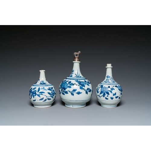 533 - Three Japanese blue and white Arita 'birds among flowering branches' pharmacy bottles, Edo, 18th C.H... 