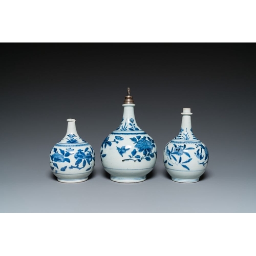 533 - Three Japanese blue and white Arita 'birds among flowering branches' pharmacy bottles, Edo, 18th C.H... 