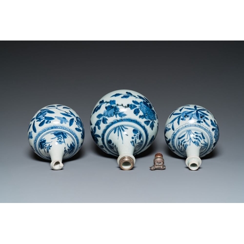 533 - Three Japanese blue and white Arita 'birds among flowering branches' pharmacy bottles, Edo, 18th C.H... 