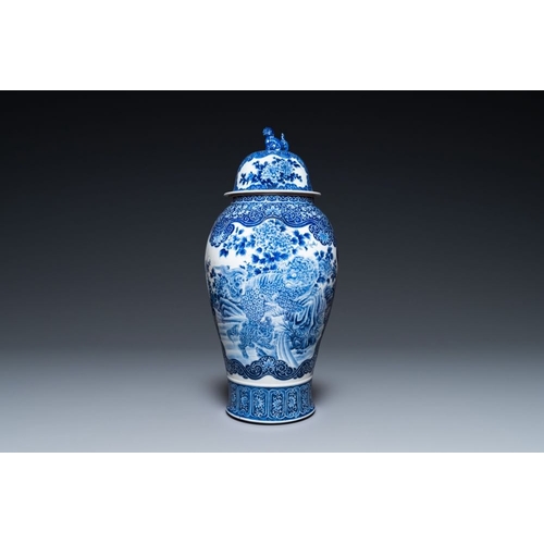 534 - A massive Japanese blue and white Arita vase and cover with an eagle, a shishi and cub, 19th C.H.: 1... 