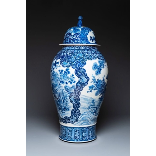 534 - A massive Japanese blue and white Arita vase and cover with an eagle, a shishi and cub, 19th C.H.: 1... 