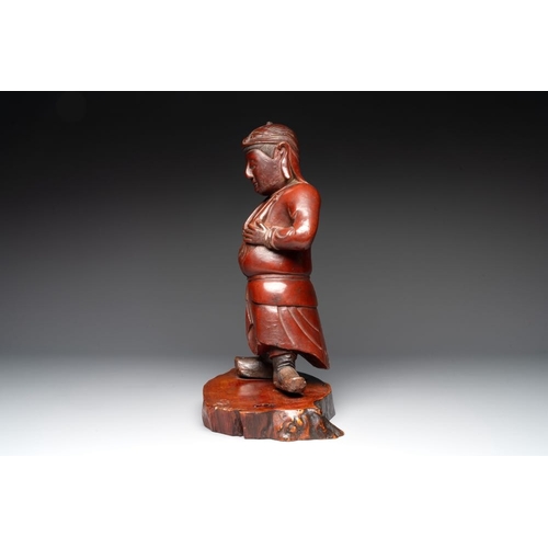 543 - A Japanese lacquered wooden figure of a guardian, 19th C.H.: 46,5 cm (incl. stand)... 