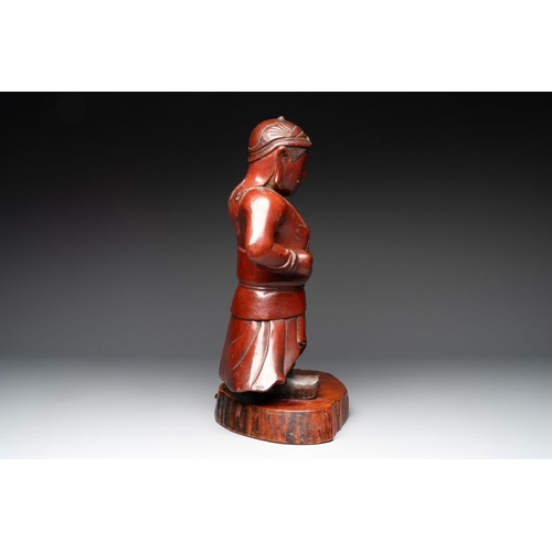 543 - A Japanese lacquered wooden figure of a guardian, 19th C.H.: 46,5 cm (incl. stand)... 