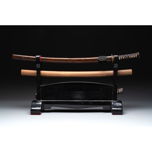 545 - A collection of fine Japanese sword handles, guards, sheaths, a sword and a lacquered stand, Edo, 18... 